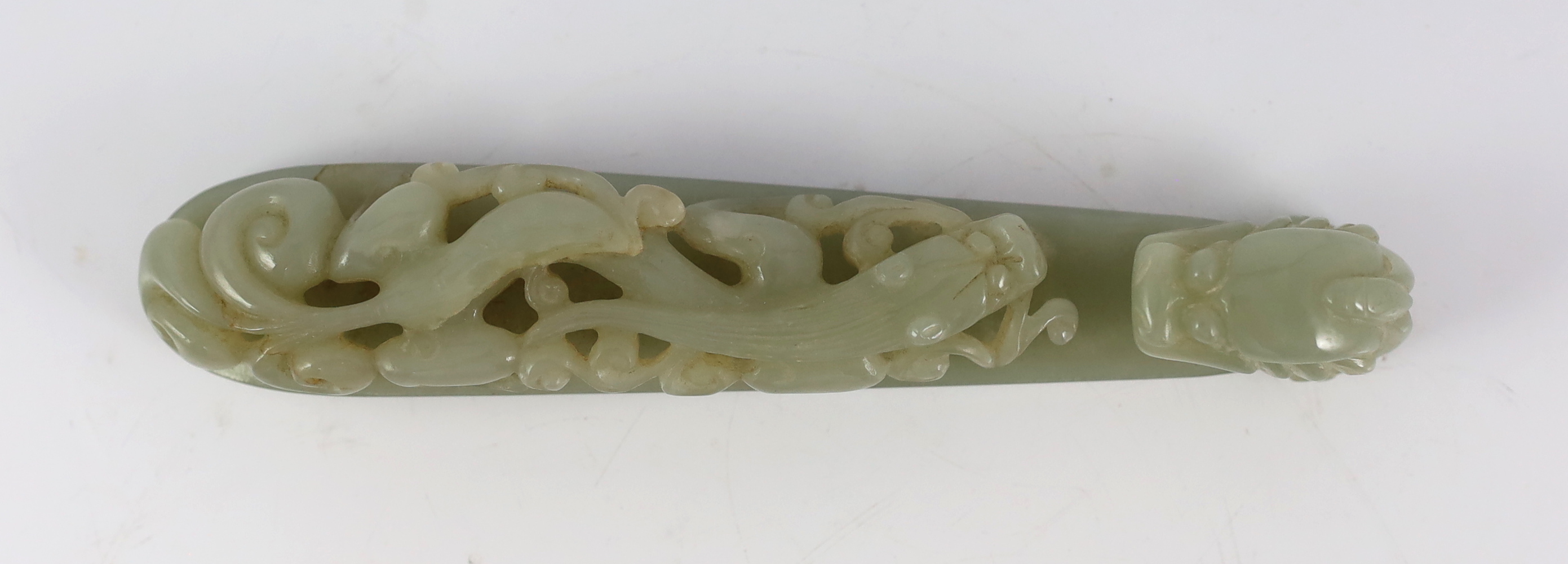 A large Chinese pale celadon jade ‘dragon’ belt hook, 18th/19th century